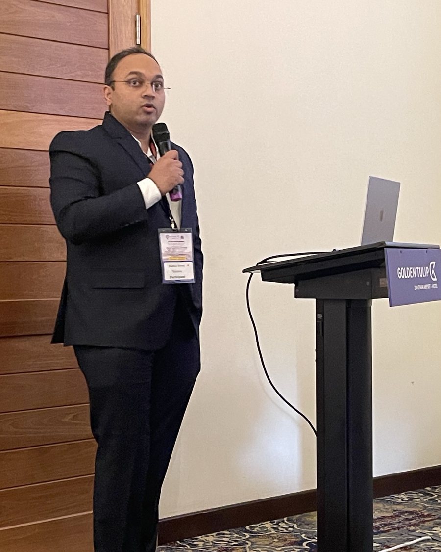 Dr Madhav Hirani speaking at a medical conference